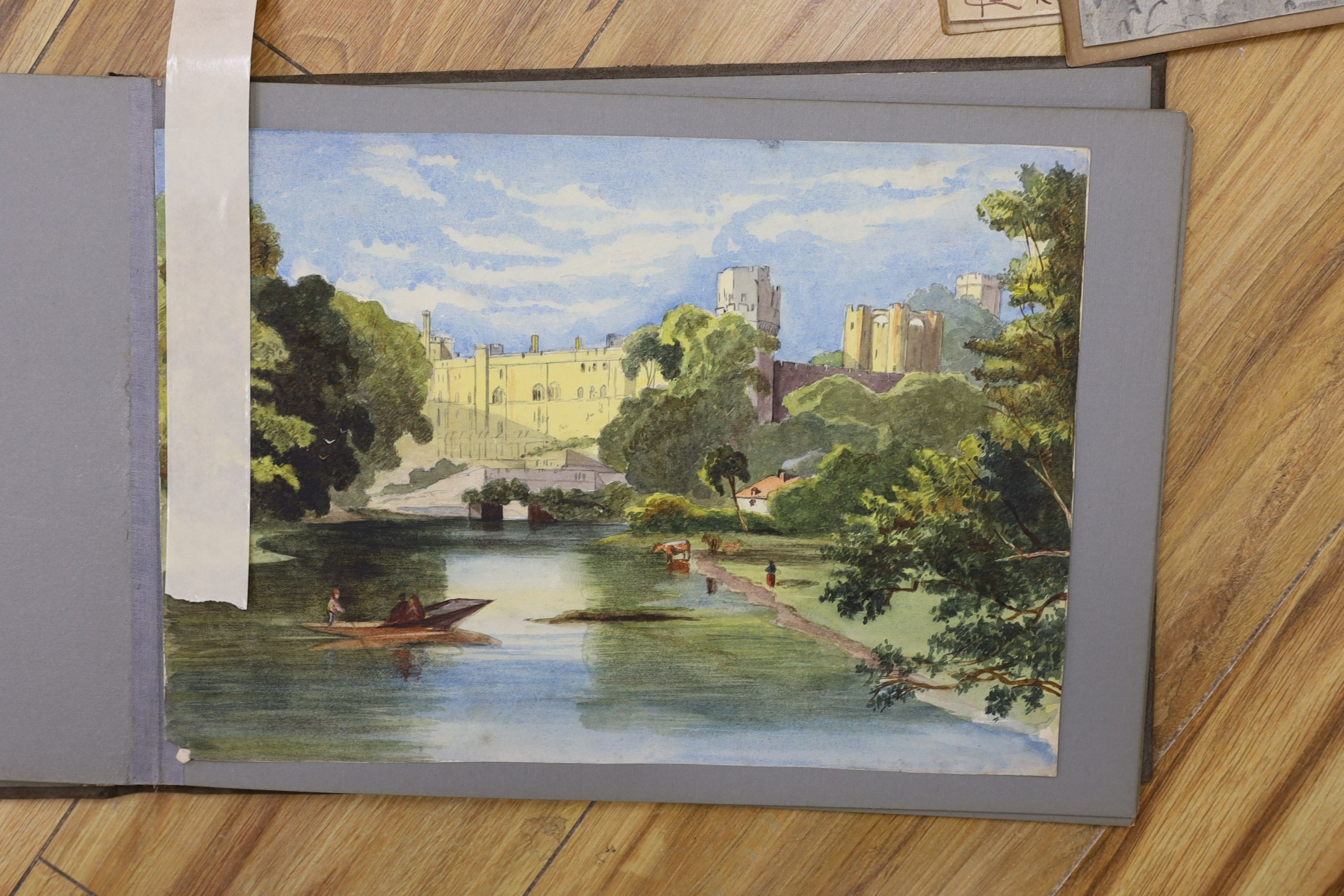 An album of mainly 19th century watercolour landscapes, various artists but including a portrait of an Italian woman monogrammed FG, 33 x 25cm and a Victor Wellersley, North African town scene, 25 x 35cm